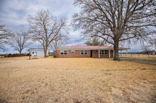 Home with acreage for sale in Blossom || $225,000