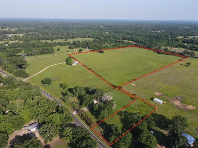 Unimproved acreage in Powderly || Glass Land and Home